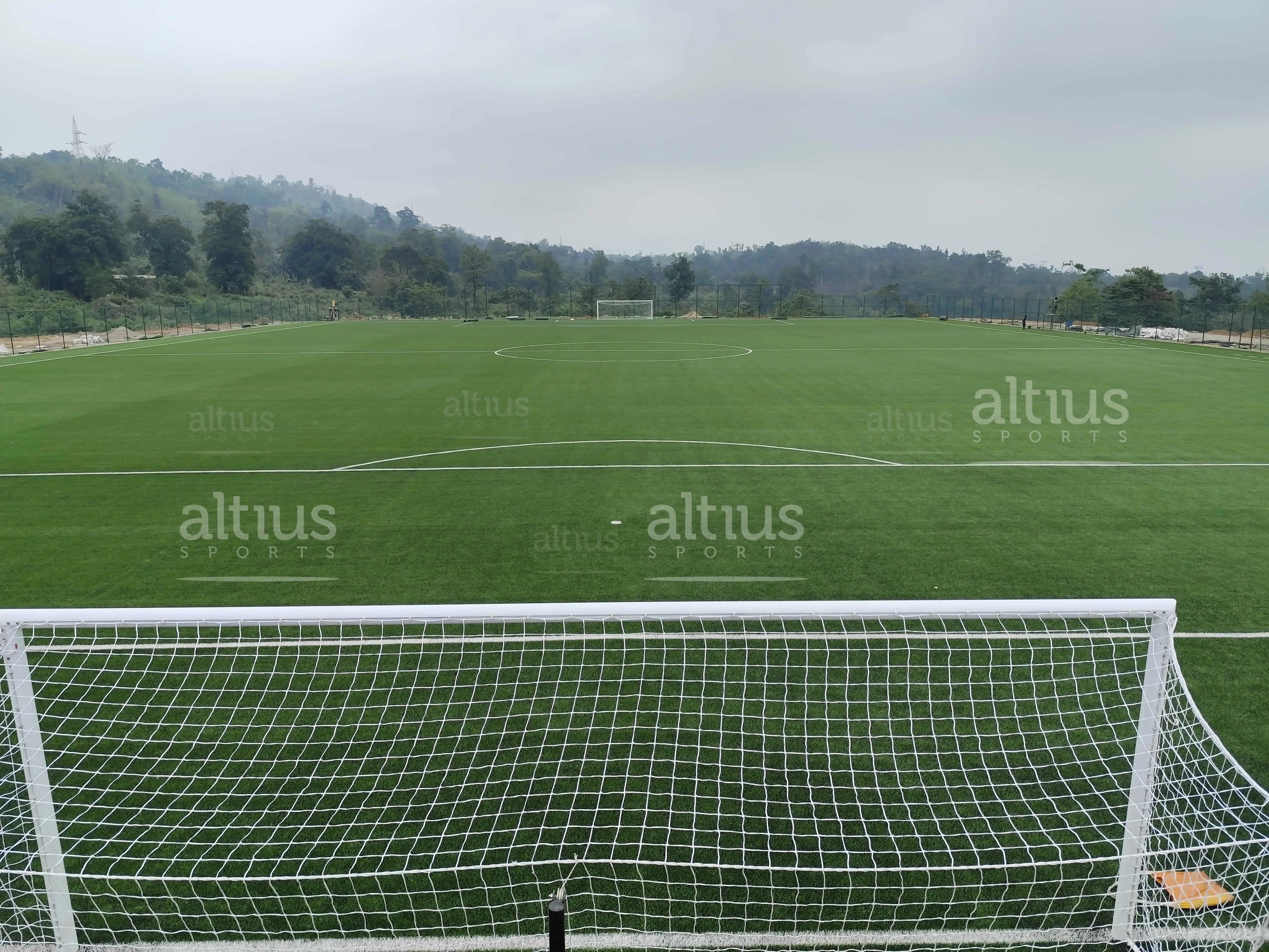 Footballers playing on a stadium